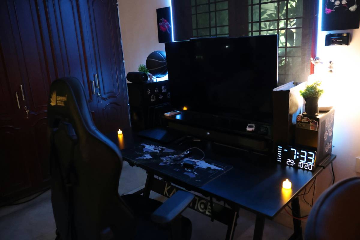 Custom gaming desk for a recliner with adjustable height and cable management